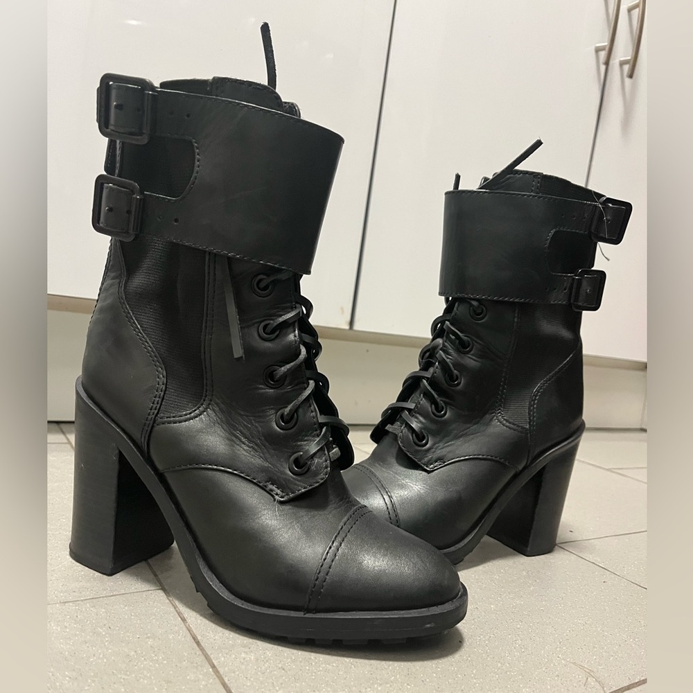 Black leather Tory Burch heeled combat boots